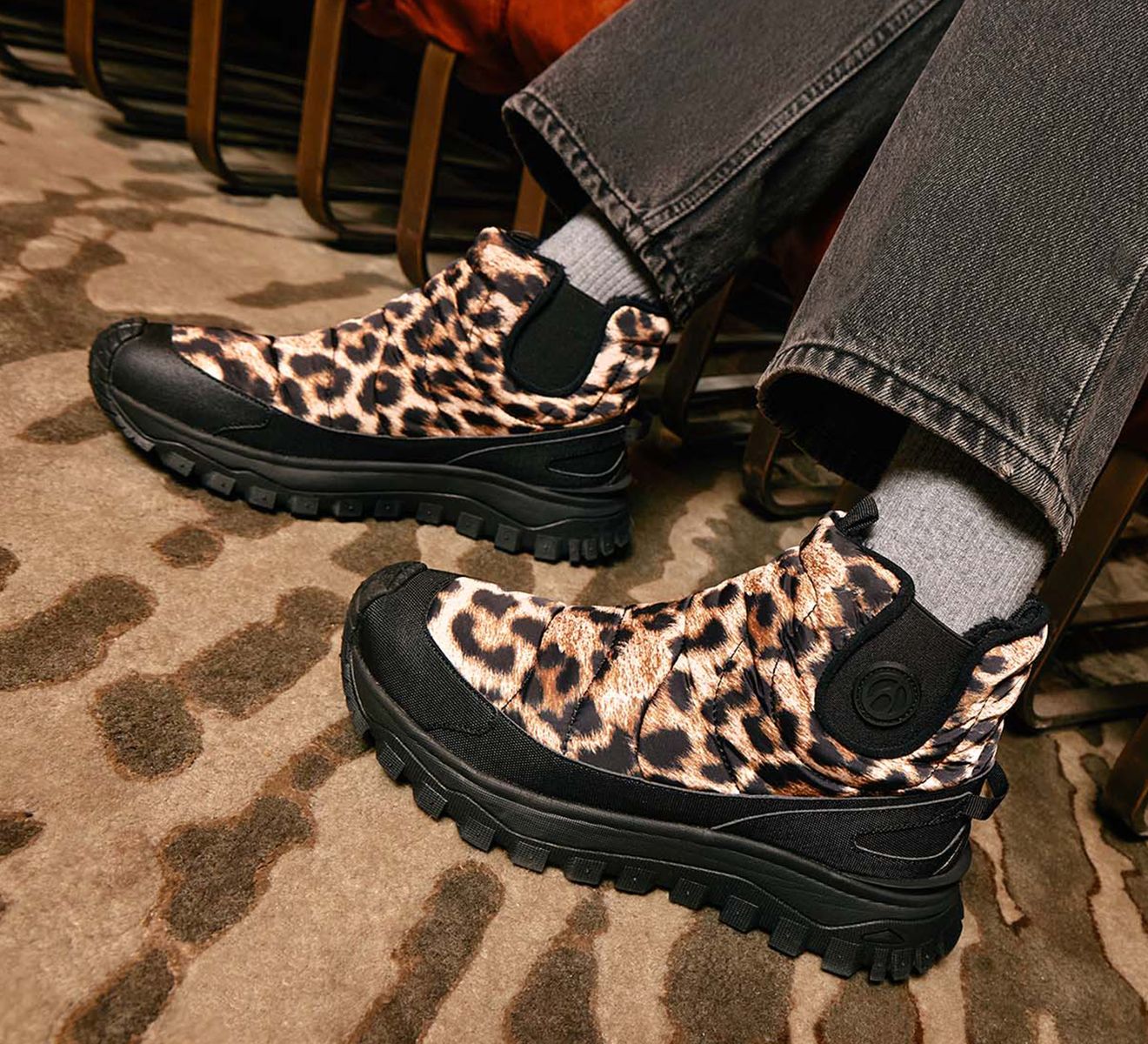 Urban outfitters leopard boots 2025