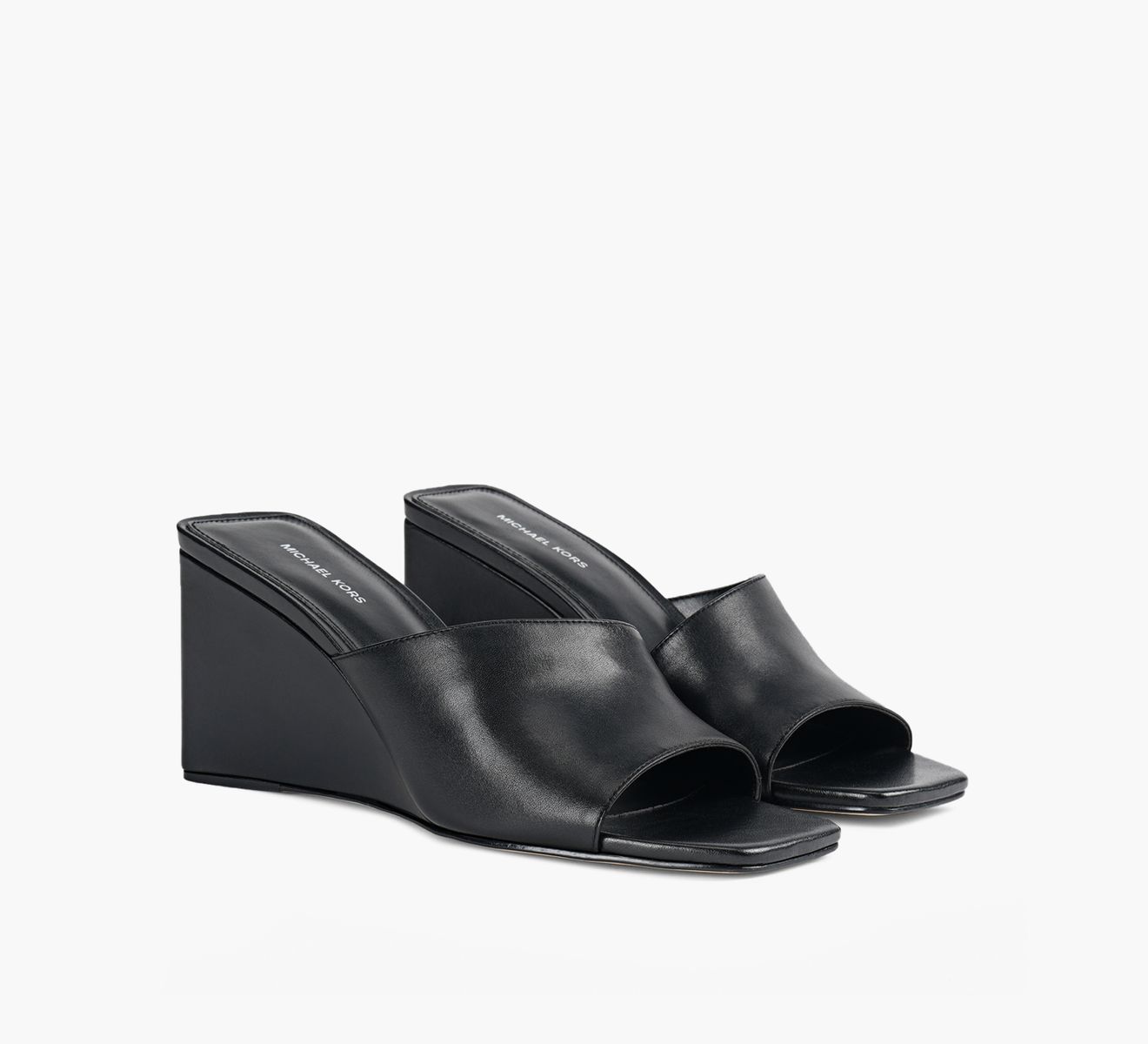 【送料&関税込】Michael Kors Merriam Wedge Leather Clogs In Michael Kors Merriam Wedge Leather Clogs In Black Color