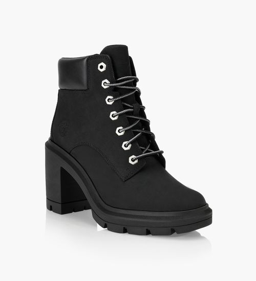 Black heeled boots 2025