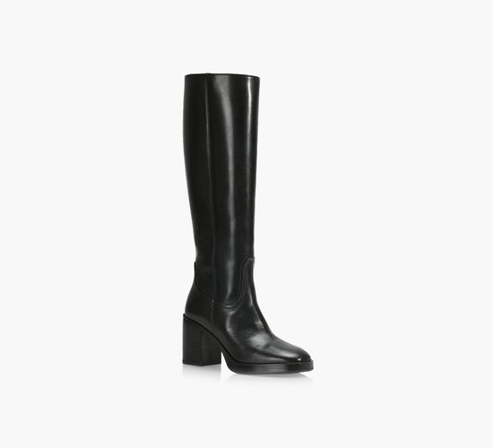 Girl in long boots store